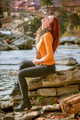 Beautiful and harmonious day on vacation in the mountains. Lady enjoying weekend with good mood. Beautiful landscapes and views for relaxing the soul and body. A healthy lifestyle
