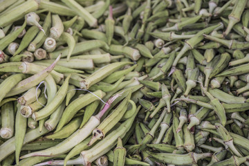 fresh raw okras as a background