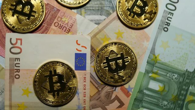 Golden Bitcoins And Euro Banknotes Rotating
