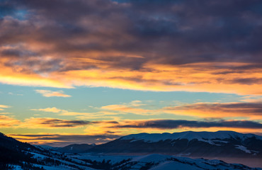 gorgeous sky on winter sunrise in mountains. beautiful nature scenery