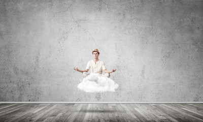 Fototapeta premium Young man keeping mind conscious.