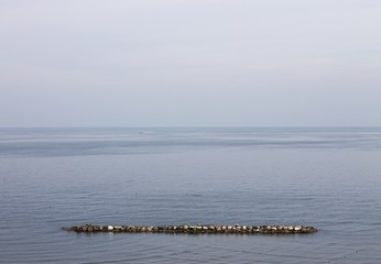 Isolated breakwater in the Mediterranean Sea (Pesaro, Italy)