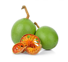 Aegle marmelos and Dry bael fruit on white background