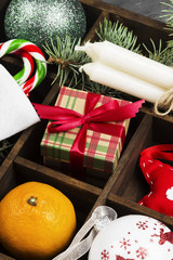 Boxes with gifts for Christmas and various attributes of holiday