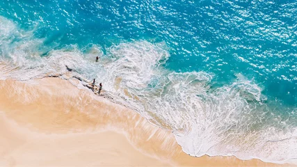 Afwasbaar Fotobehang Oceaan golf Aerial view to tropical sandy beach and blue ocean