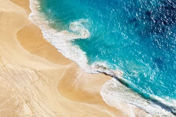 Zelfklevend Fotobehang Aerial view to tropical sandy beach and blue ocean © Ivan Kurmyshov