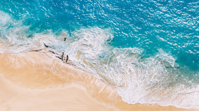 Fototapeta Aerial view to tropical sandy beach and blue ocean