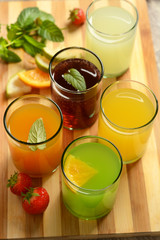 assorted fruit juices with ingredients around