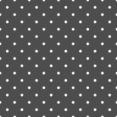 White polka dots on grey background