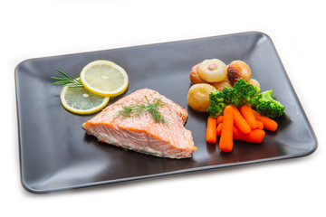 salmon fillet with baked onion and carrot