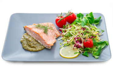 salmon fillet with sauce and mixed salad