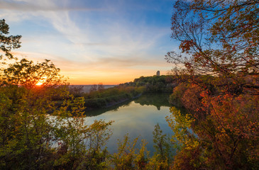 Farfa (Rieti, Italy) - The little lake of Baccelli at sunset, in the heart of Sabina region, during the autumn with foliage