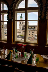 The view of the Cathedral of the city of Salzburg through the window, Austria