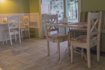 Fototapeta na wymiar Interior of a cozy cafe in retro style