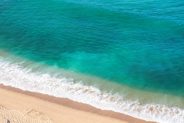 Wave on the sand beach background