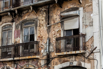 Fototapeta na wymiar Exterior windows of an old building .