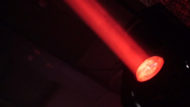 Camera Shows Powerful Red Light Laser Projector in Darkness