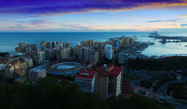 Sunrise view of Malaga with Port and Placa de Torros