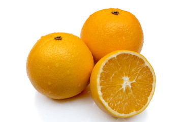 Oranges with leaf isolated on white.