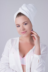 girl in a towel portrait after a shower relaxation rest skin care tender beauty