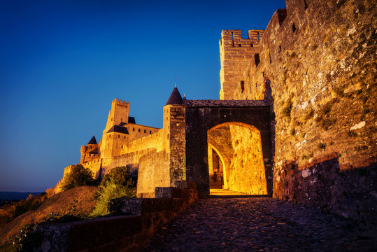 Cite de Carcassonne, France, small alleys during sunset.
