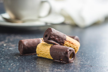 Sweet dessert. Biscuits rolls with chocolate.