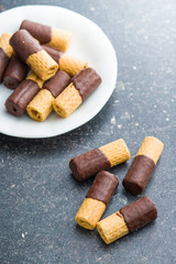 Sweet dessert. Biscuits rolls with chocolate.
