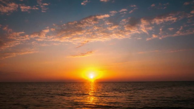 Sunset over the sea. timelapse