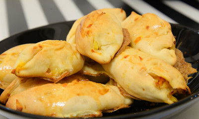 Pies on plate.