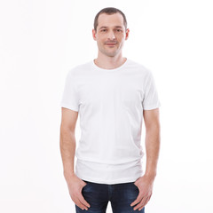 Fototapeta premium t-shirt design and people concept - close up of young man in blank white t-shirt, shirt front and rear isolated.