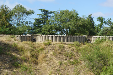 The reconstruction of old military positions with a parapet and a ship's cannon on the hill