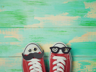Sneakers shoes with mustache and eyeglasses