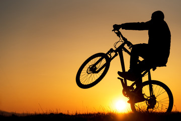 Fototapeta na wymiar silhouette of biker