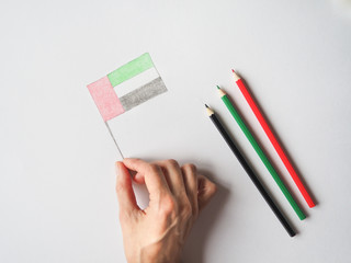 Naklejka premium UAE National Day celebration decorative item. Colored pencils to color the flag of the country. 