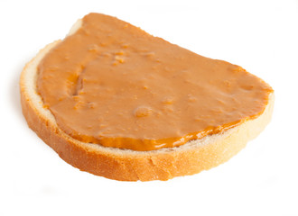 bread slice with nut butter, isolated on white background