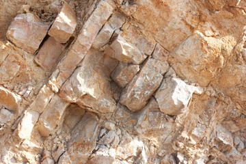 Rough large  natural stone wall, background.