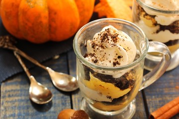 Homemade Pumpkin Mousse Parfait / Thanksgiving dessert, selective focus
