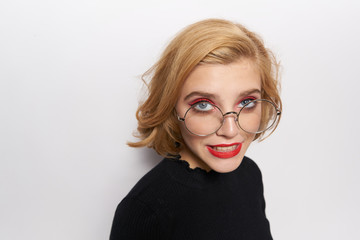 Fototapeta premium blonde, glasses, bright make-up, close-up