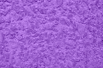 Fototapeta na wymiar Violet wall of natural stone, texture, background