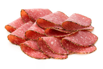 Salami slices isolated on the white background.