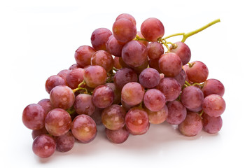 Obraz premium Ripe red grape isolated on white.