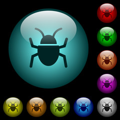 Bug icons in color illuminated glass buttons