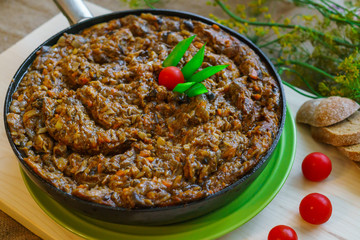 Extinguishing forest mushrooms cooked with onions and carrots