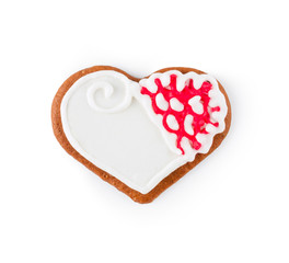 Gingerbread in the form of heart - Christmas homemade sweet cookie, isolated on white background