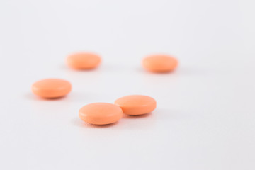 Obraz na płótnie Canvas Orange pills