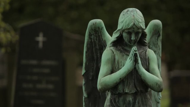Cemetary Angel and Tombstones