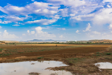 Fototapeta na wymiar View of the indian rural landscape, Puttaparthi, Andhra Pradesh, India. Copy space for text.