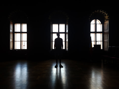 Silhouette of a man in the contra light