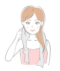 髪を拭く女性