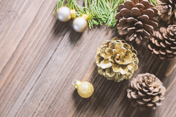 Pine cones ,Christmas party accessories on wooden table